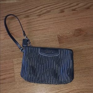 Gray pleated Coach wristlet